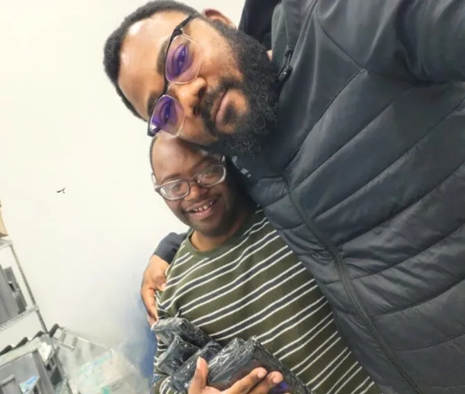 Mercyland Direct Support Professional Yannick with Tremain Jones.